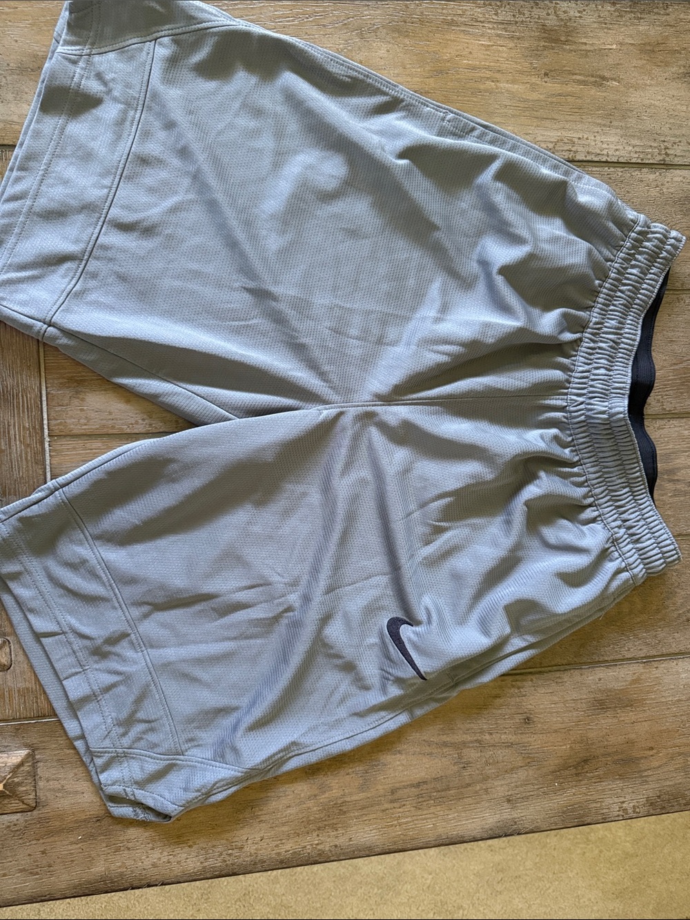 Nike Men's Light Gray Athletic Training Shorts with Black Swoosh